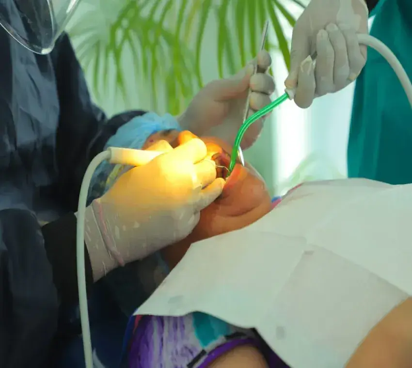 Dental specialist treating a patient at Dentonation